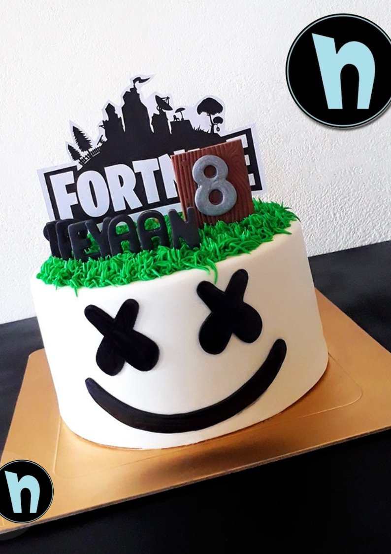 Fortnite Marshmallow themed cake . Paper topper